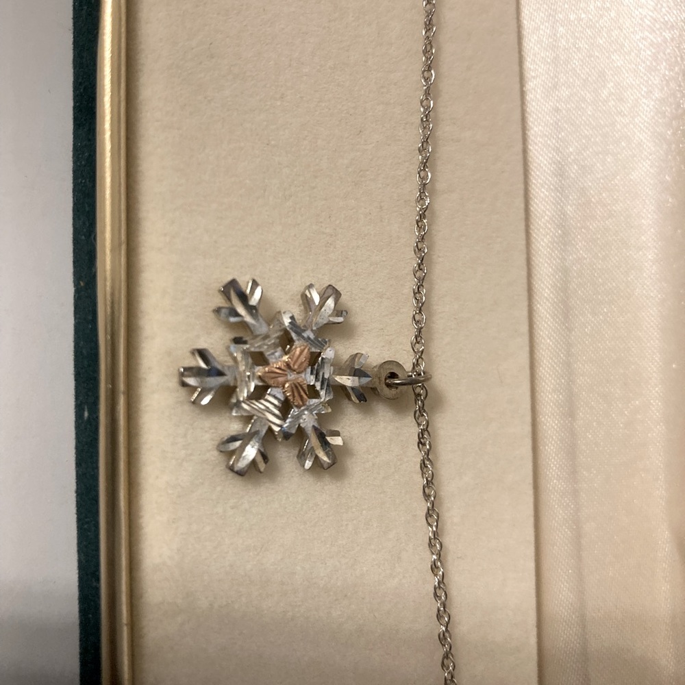 Landstrom’s Black Hills Gold Sterling Silver Snowflake Pendant on Chain